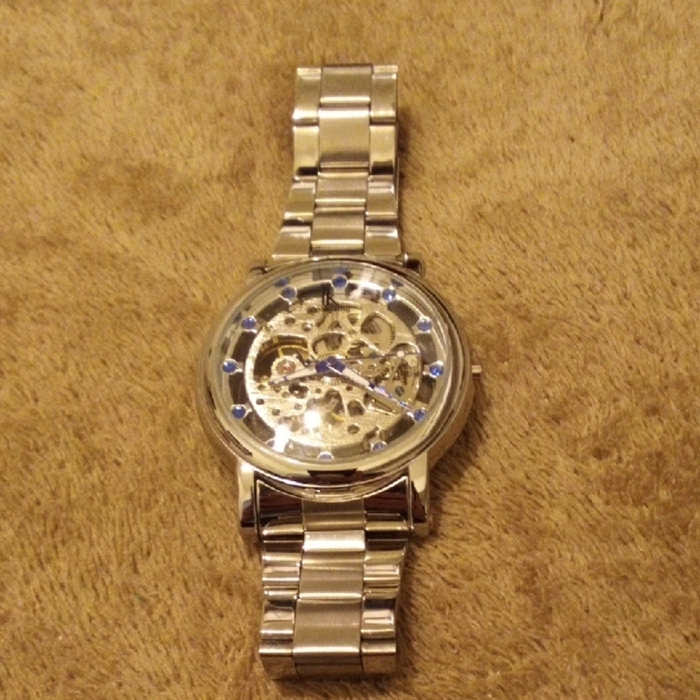 Elegant Silver Watch with Blue Details